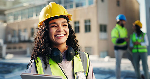 Smiling civil engineer on a construction site